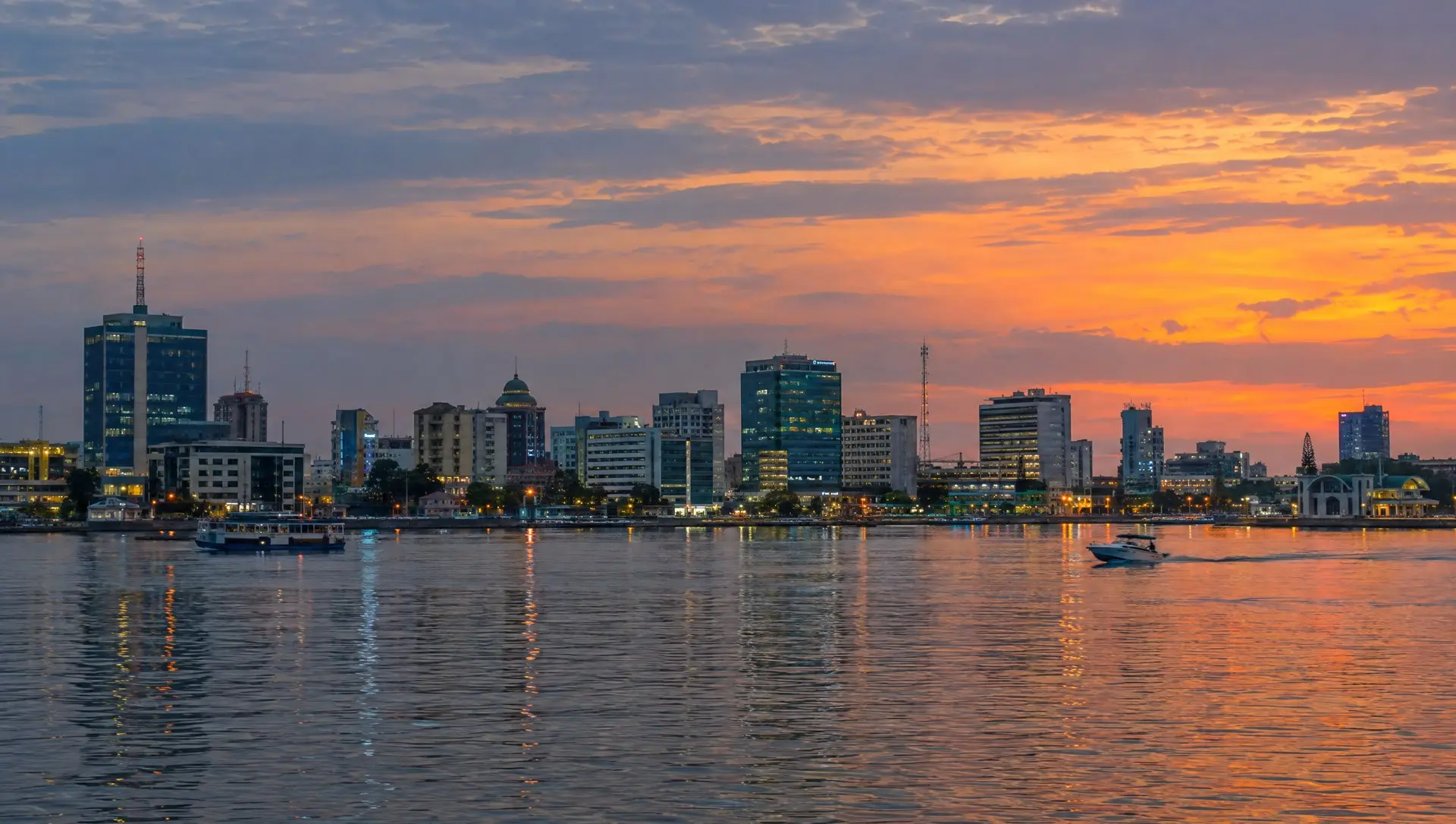 The Lagos Island skyline at dusk seen across the lagoon